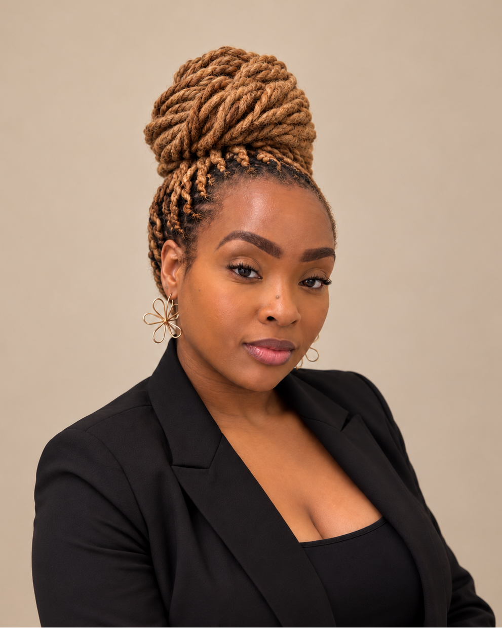 Professional shot of Kyra with beige background.